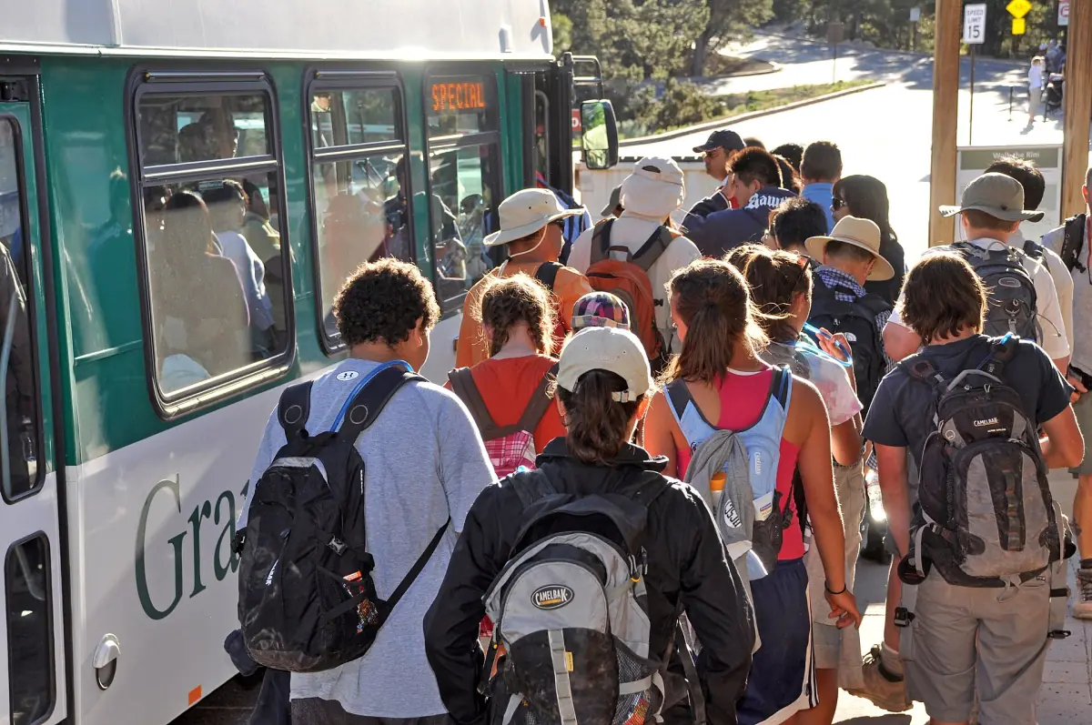 Visitors boarding the Hermit Road shuttle bus